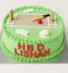 Cricket theme cake with fondant pitch, bat, ball, stumps, and grass design