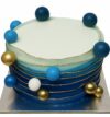 Royal Blue Theme Cake with edible golden spheres – BakersStreet Yelahanka.